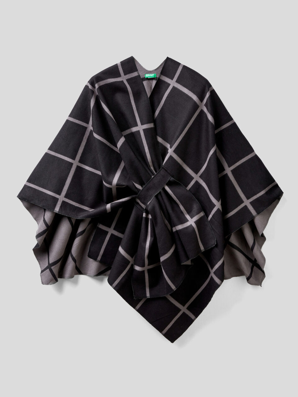 Printed and solid poncho image number 1