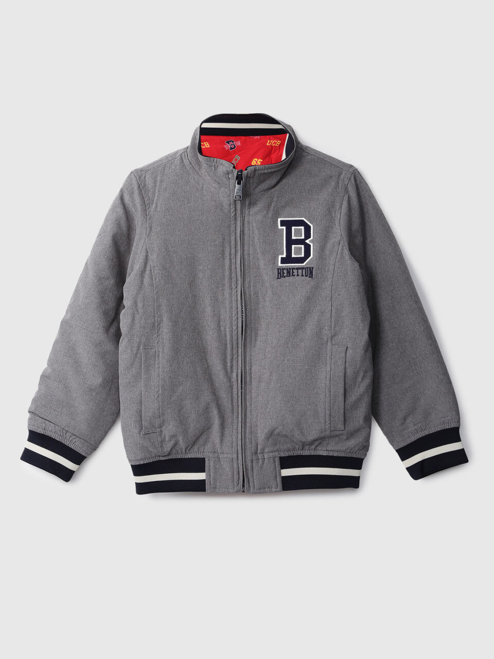REVERSIBLE JACKET WITH AOP AND BADGE image number 1