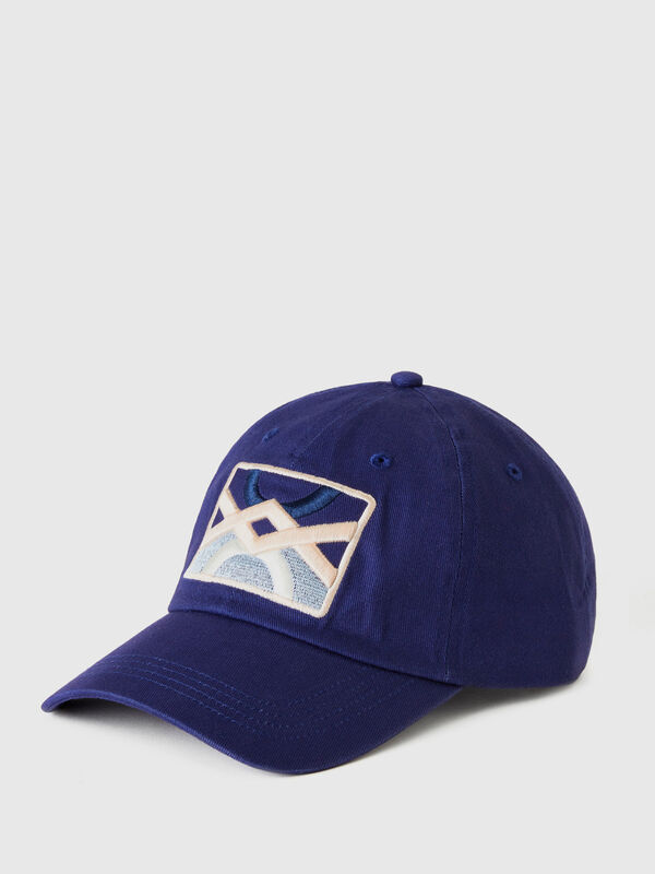 Blue cap with logo patch