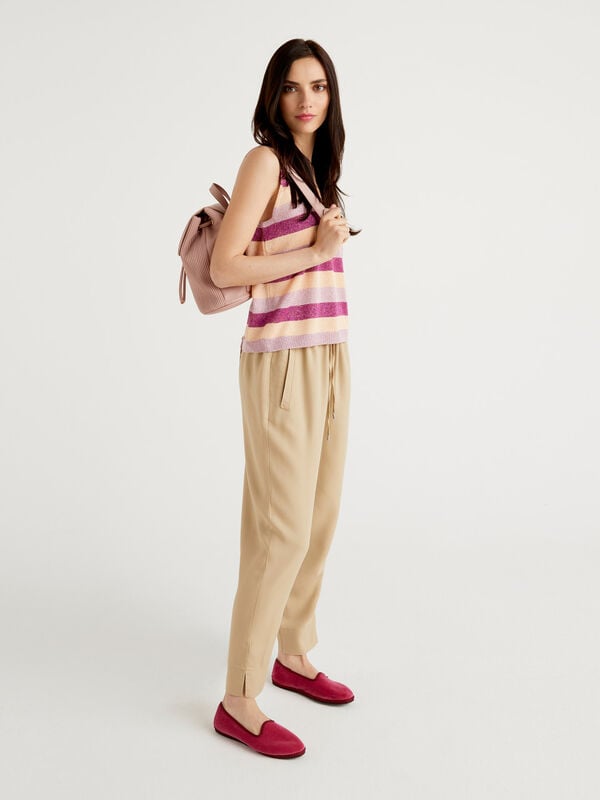 Trousers with solid colored drawstring Women