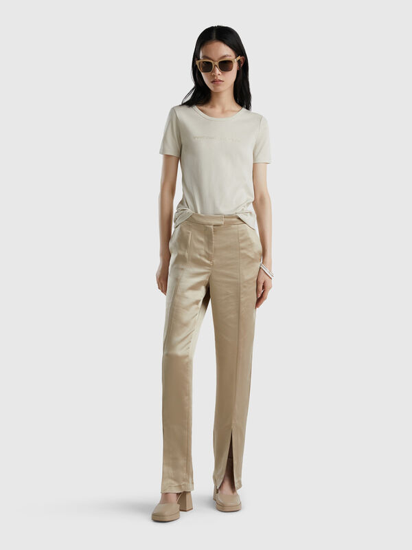 Satin look trousers with slit Women