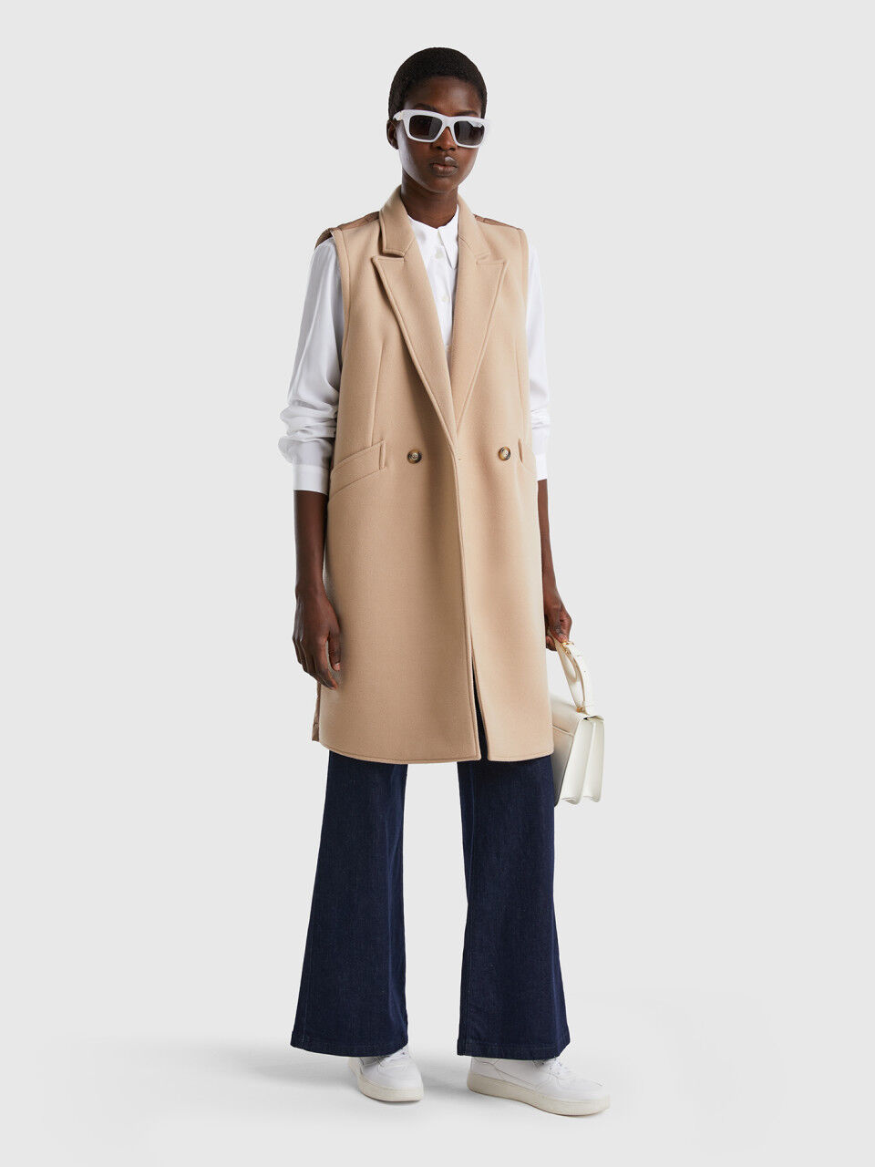 Sleeveless long sales coats for ladies