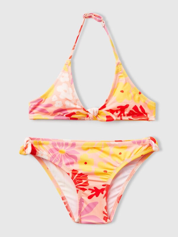 Bikini de playa con estampado de flores. Niña