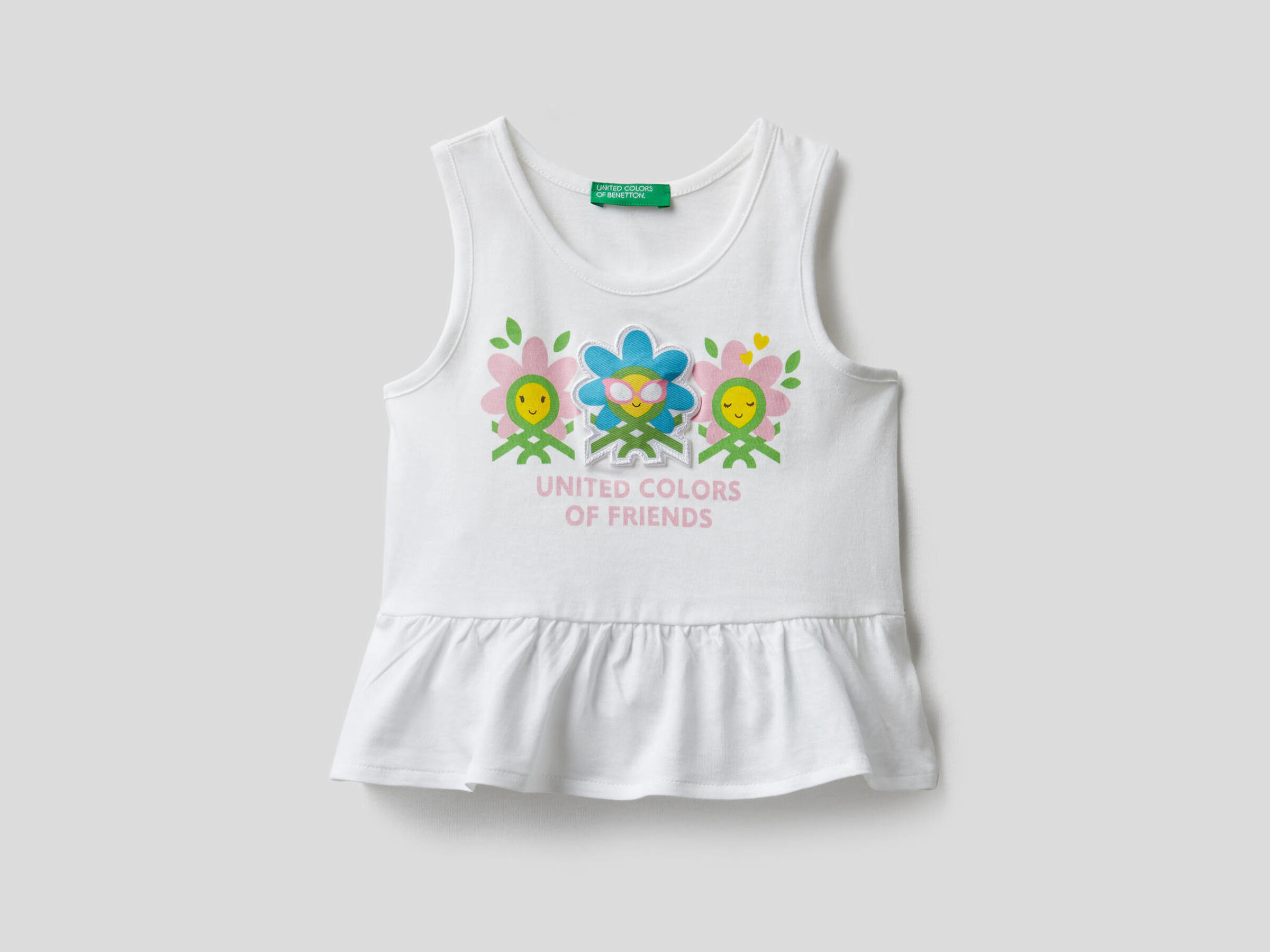 100% cotton tank top with frill on the bottom image number null