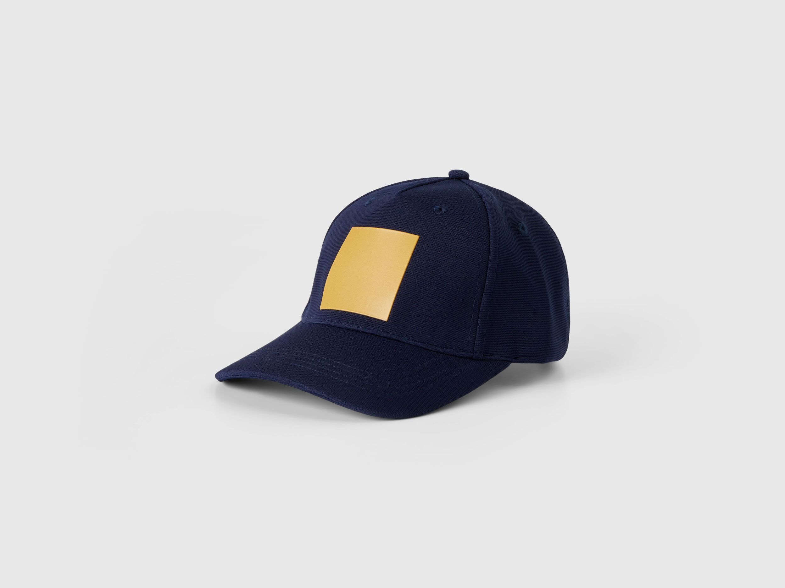 Dark blue hat with yellow print Dark Blue Benetton