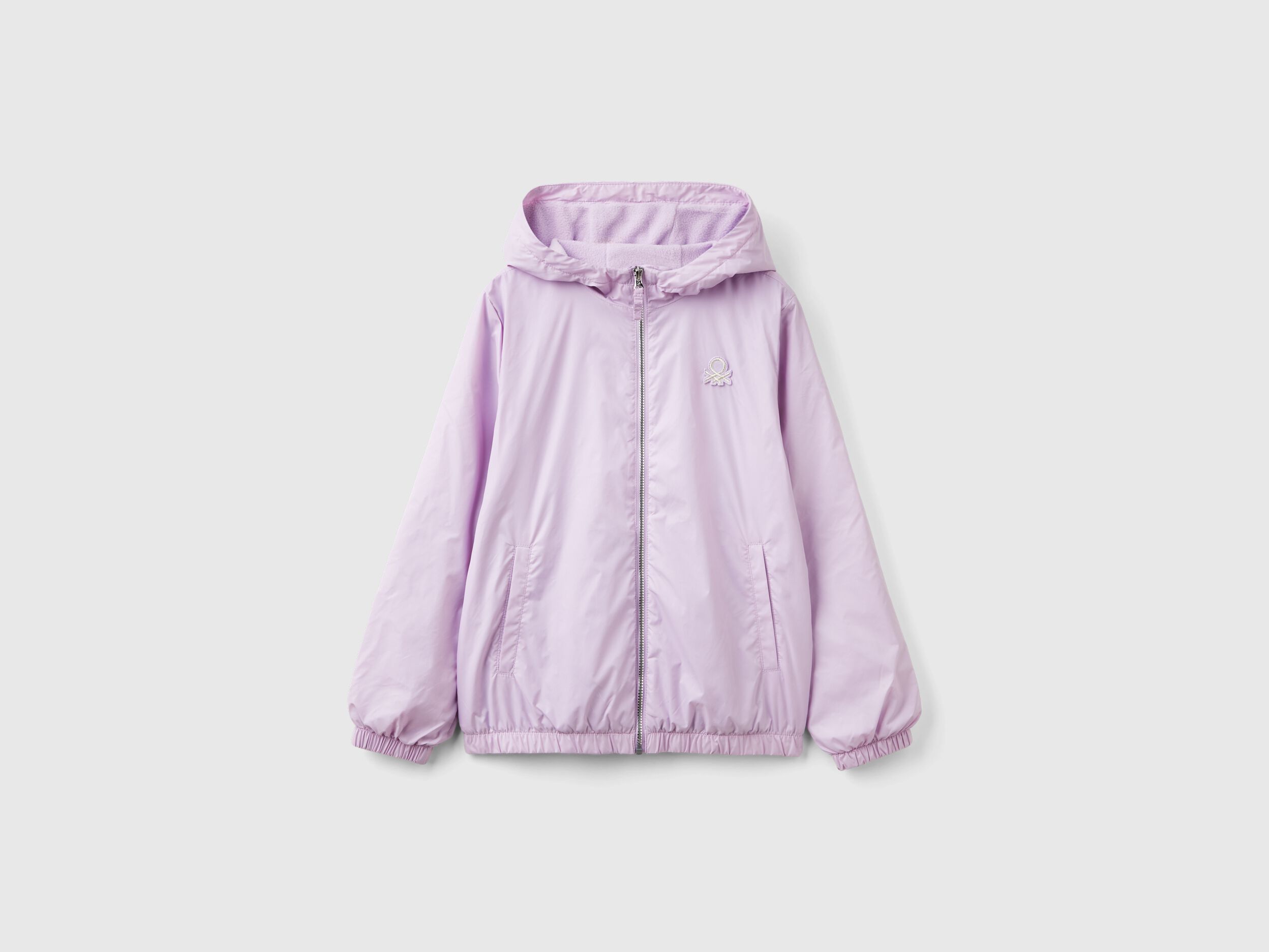 Glossy jacket with zip and hood - Lilac | Benetton
