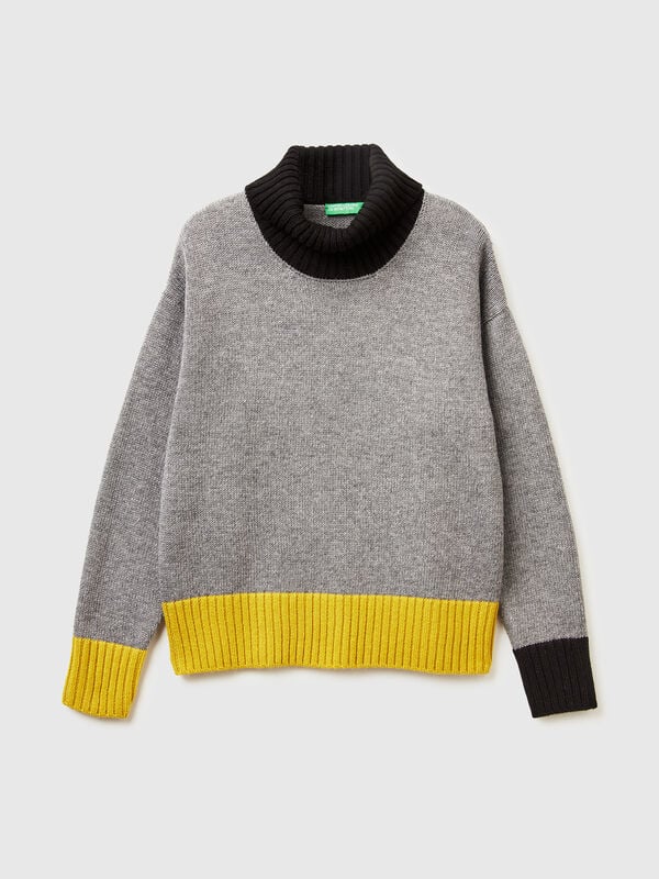 Cuello alto con bloques de color Cuello alto con bloques de color Mujer