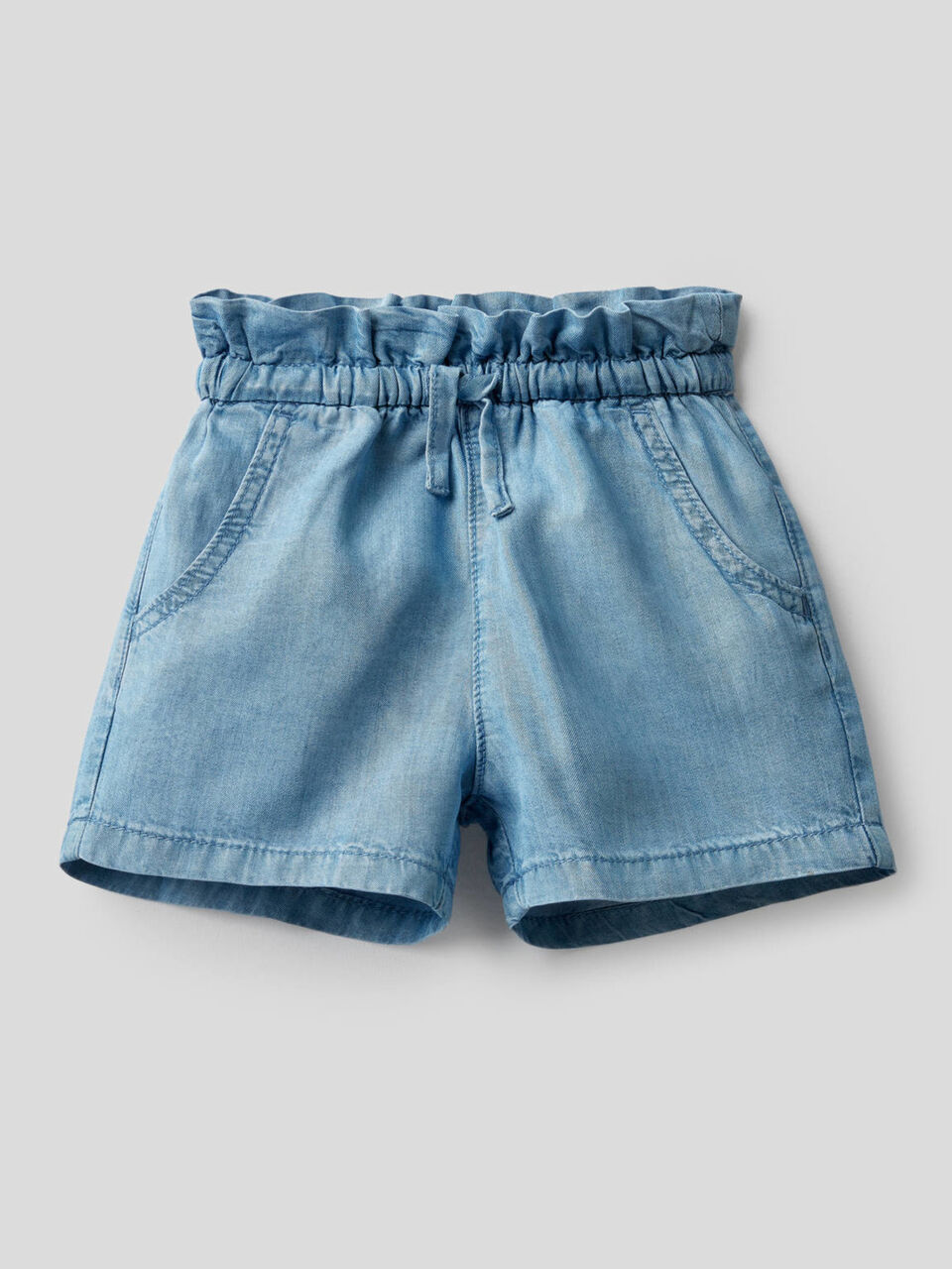 High-waisted shorts in light denim image number 1