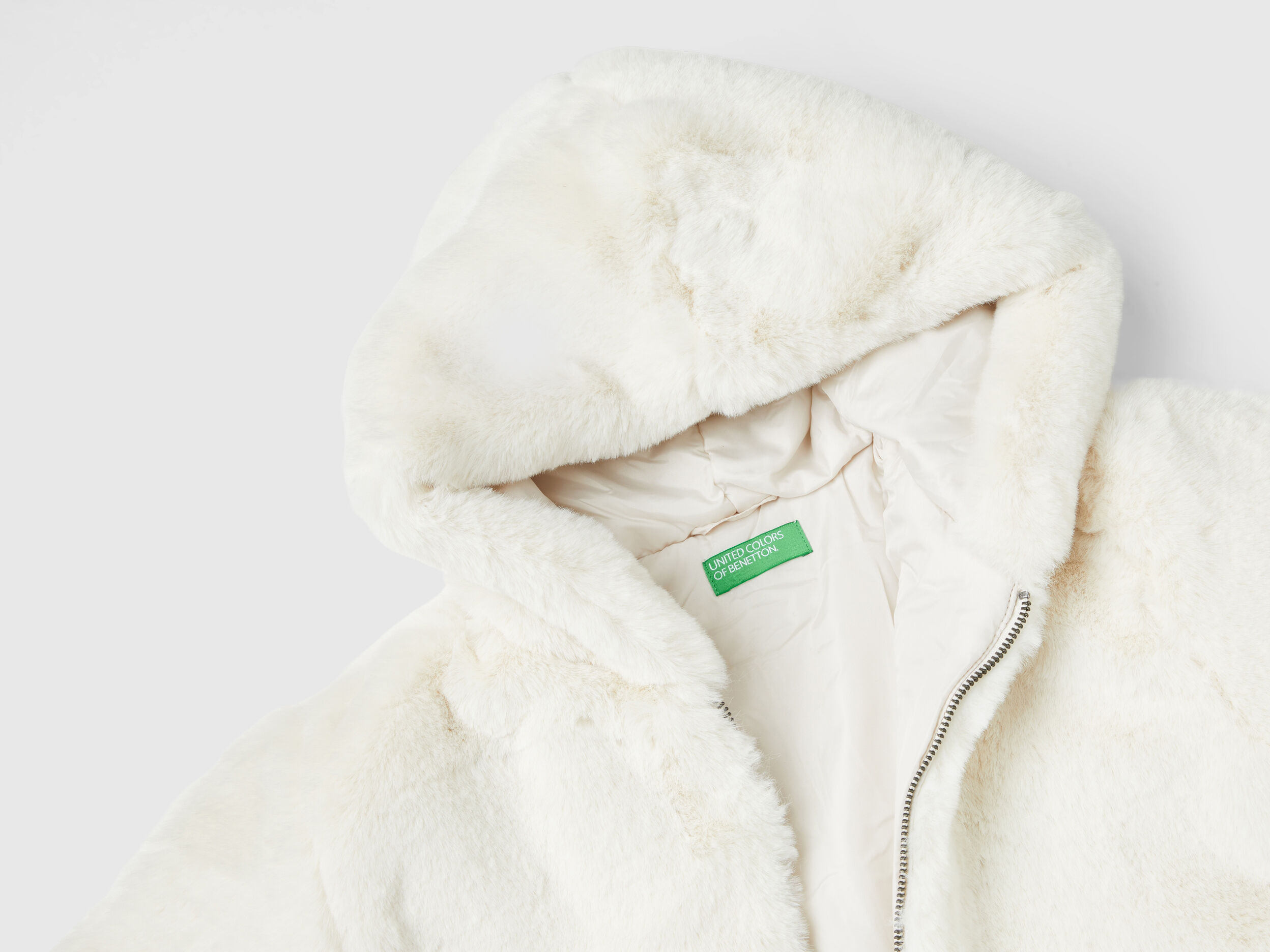 Jacket in faux fur - Creamy White | Benetton
