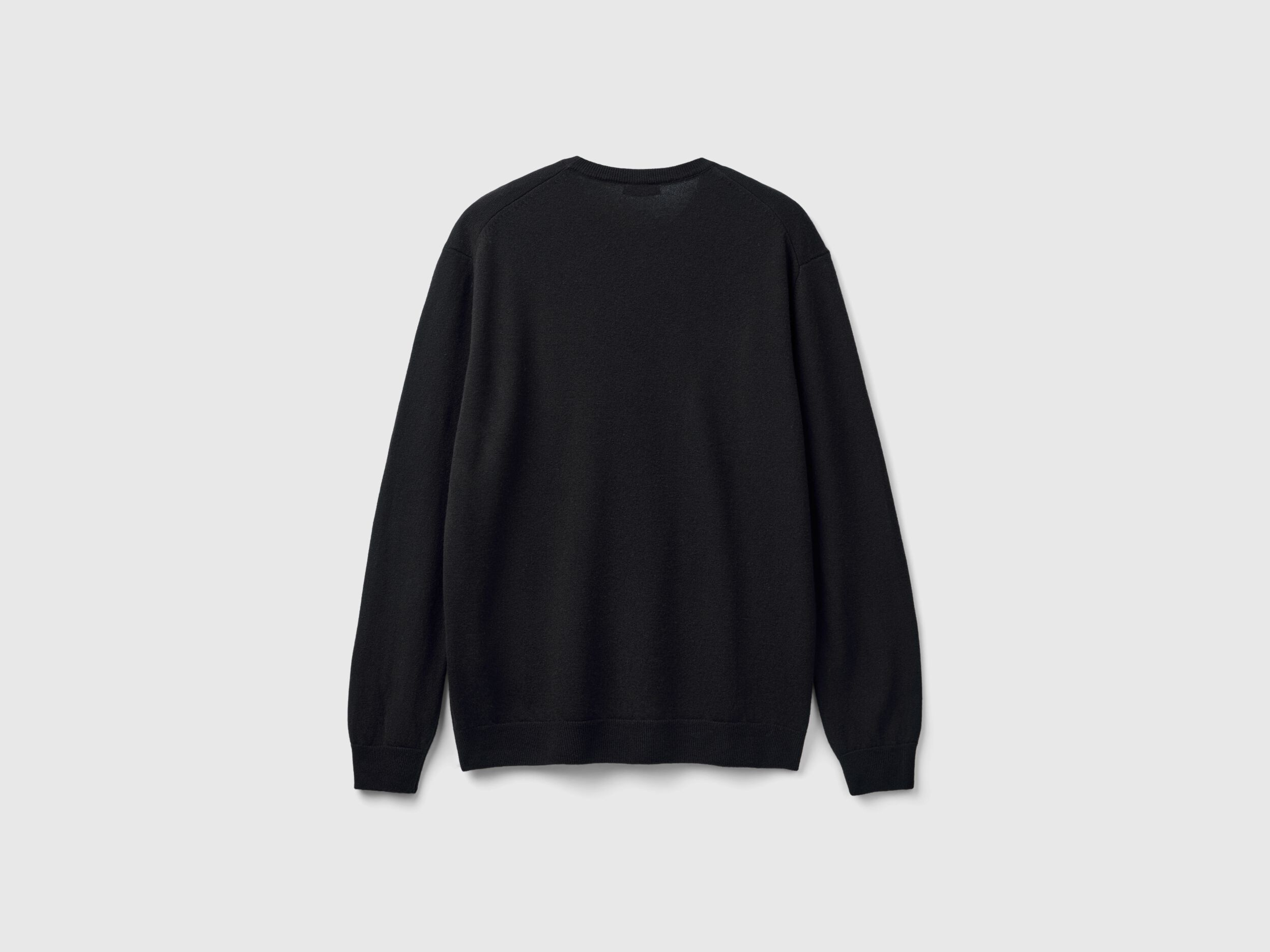 Black crew neck sweater in pure Merino wool Black Benetton