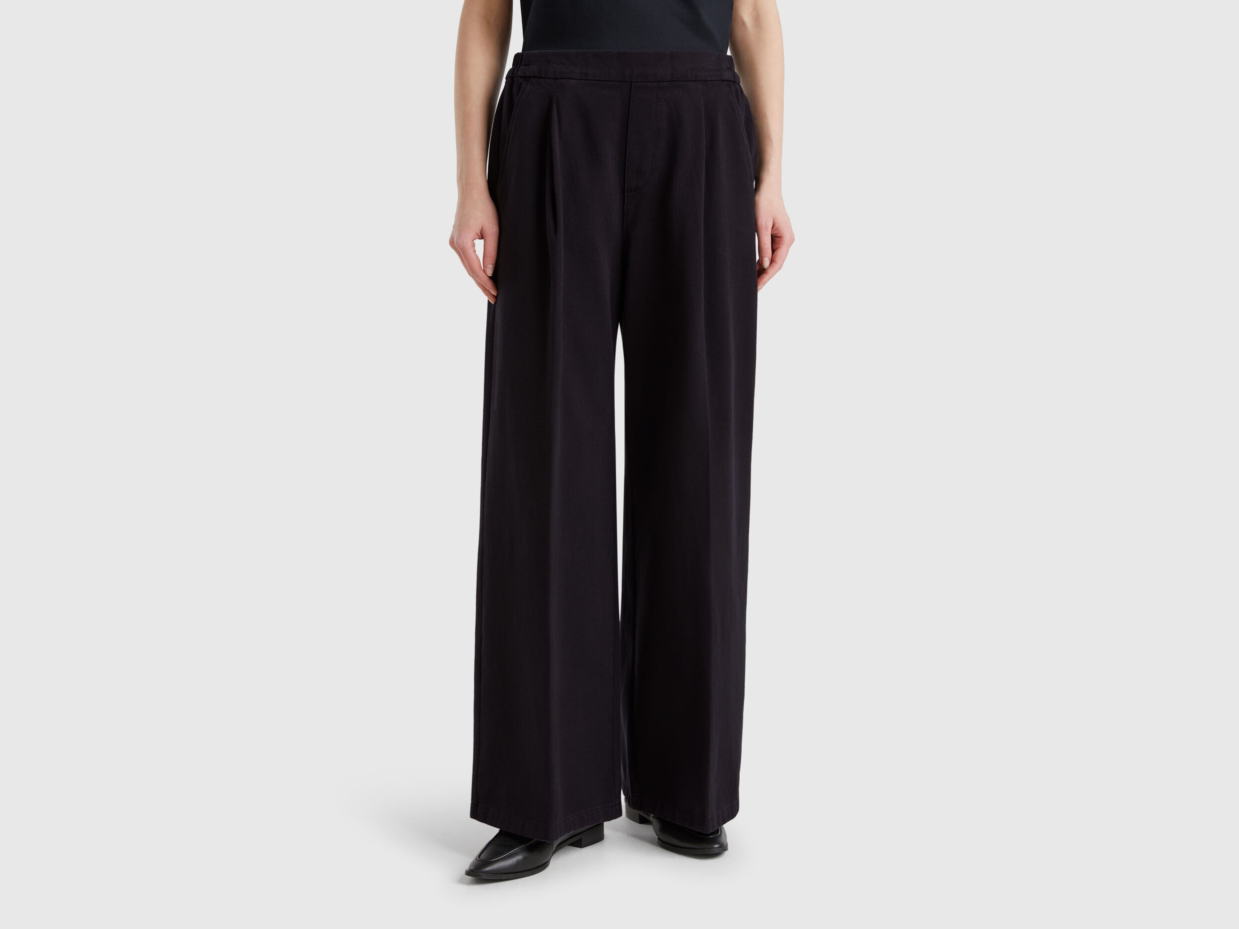 High-waisted palazzo trousers - Black | Benetton