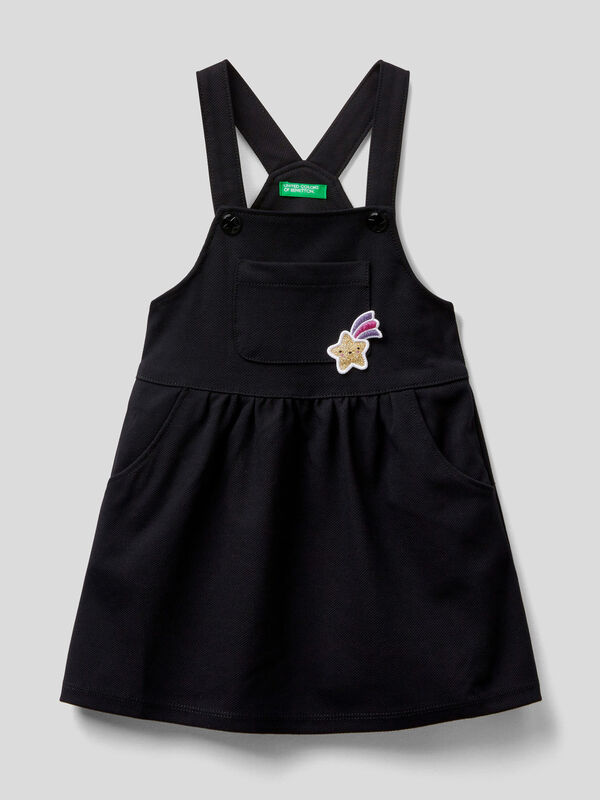 Dungaree skirt with star patch Junior Girl