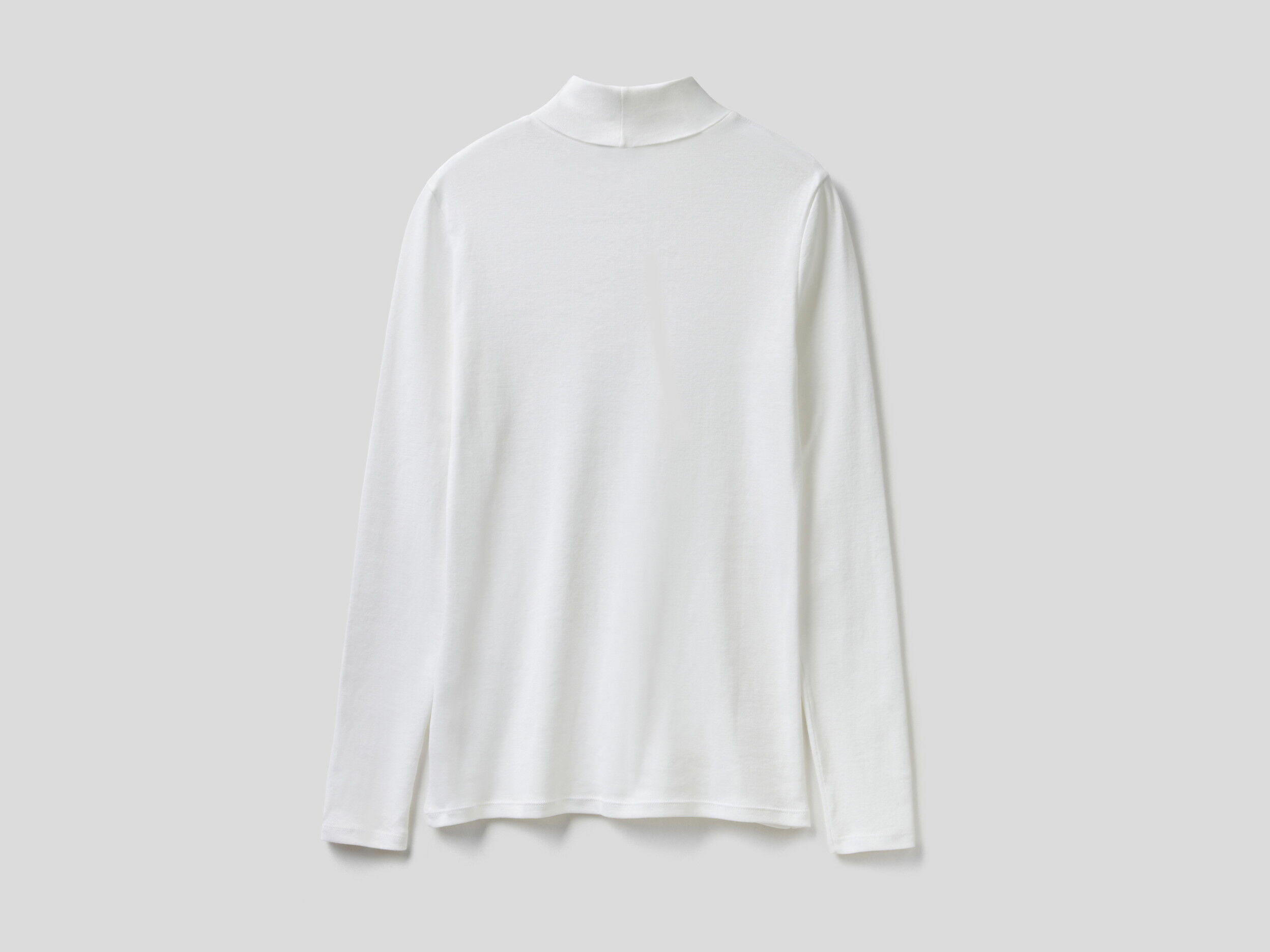 Long sleeve high clearance neck white top