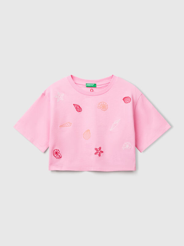 Camiseta rosa con bordado de conchas Niña
