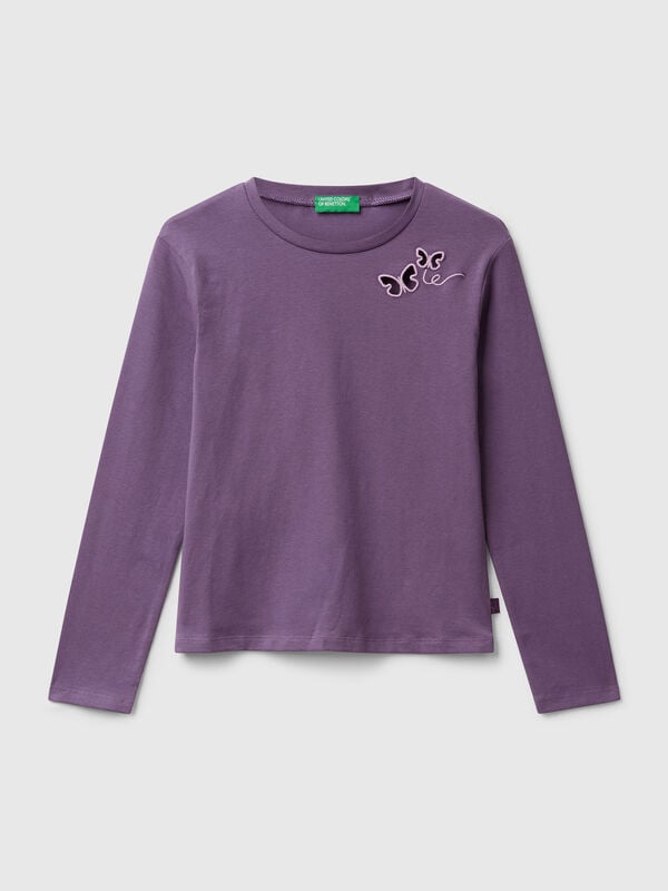 Camiseta con mariposas recortadas Niña