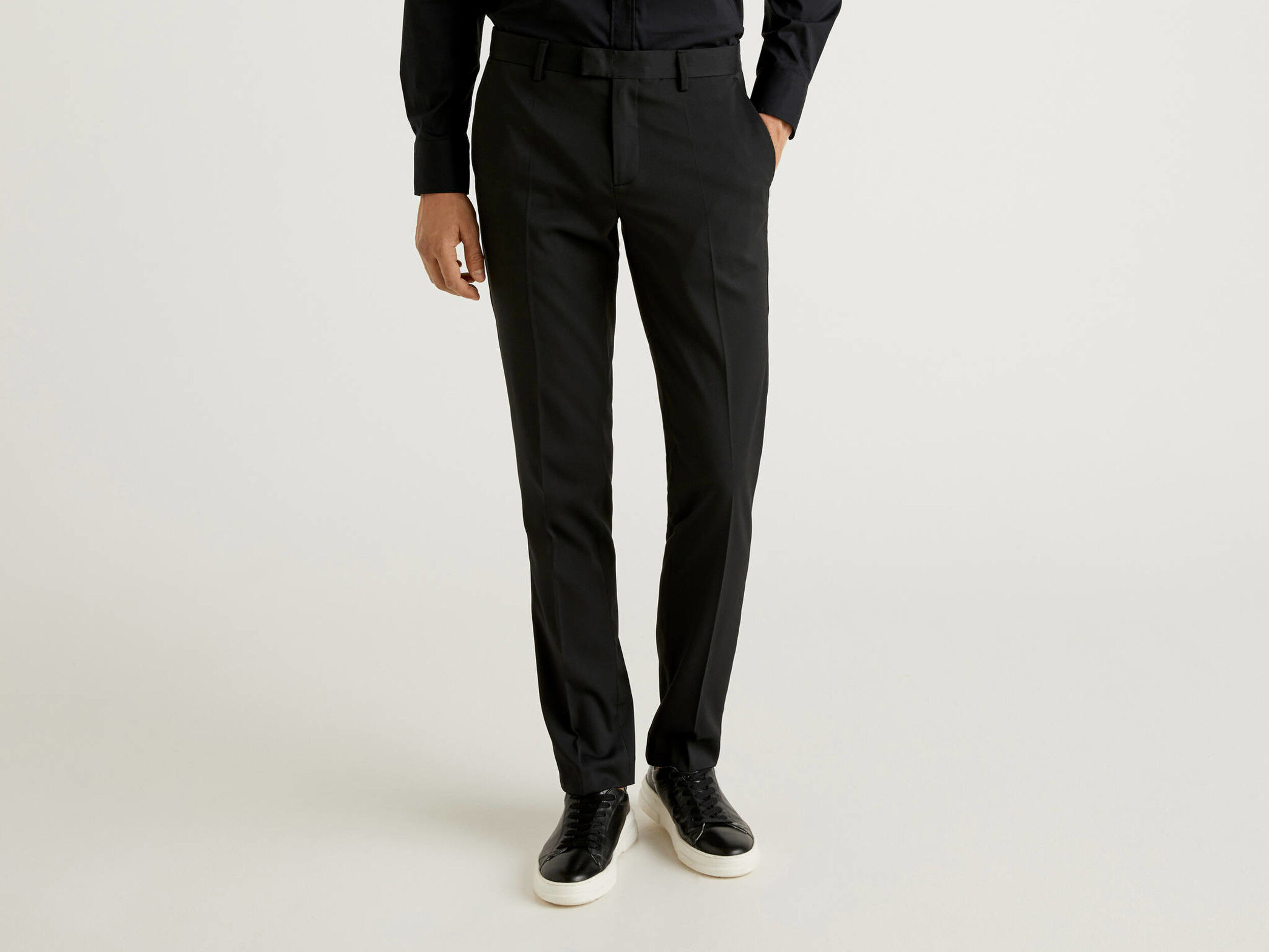 Slim fit trousers with crease - Black | Benetton