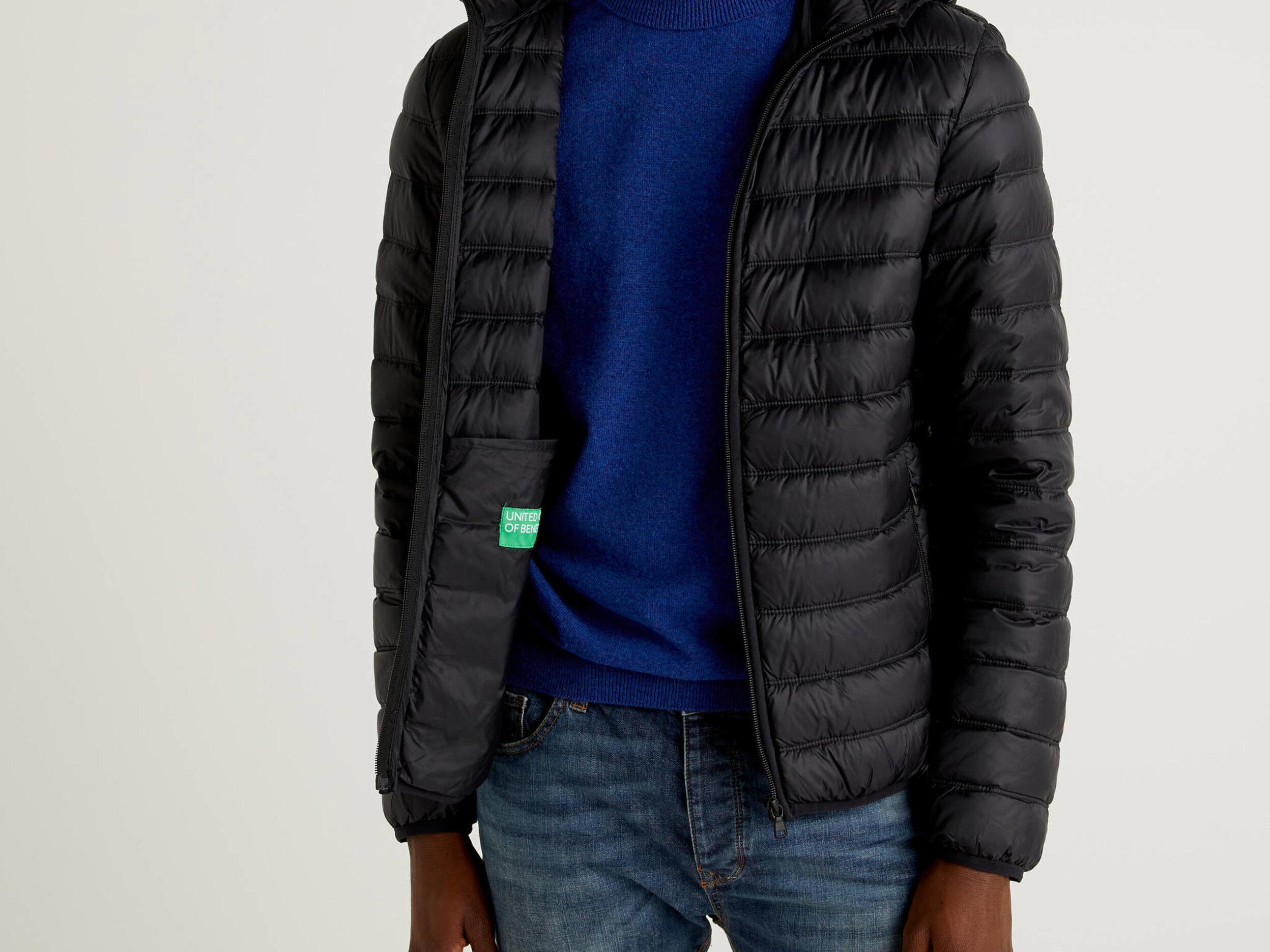 black and blue puffer jacket