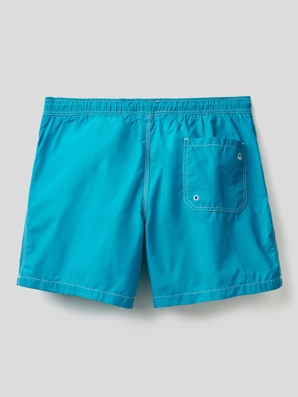 Swim trunks with clashing details image number 2