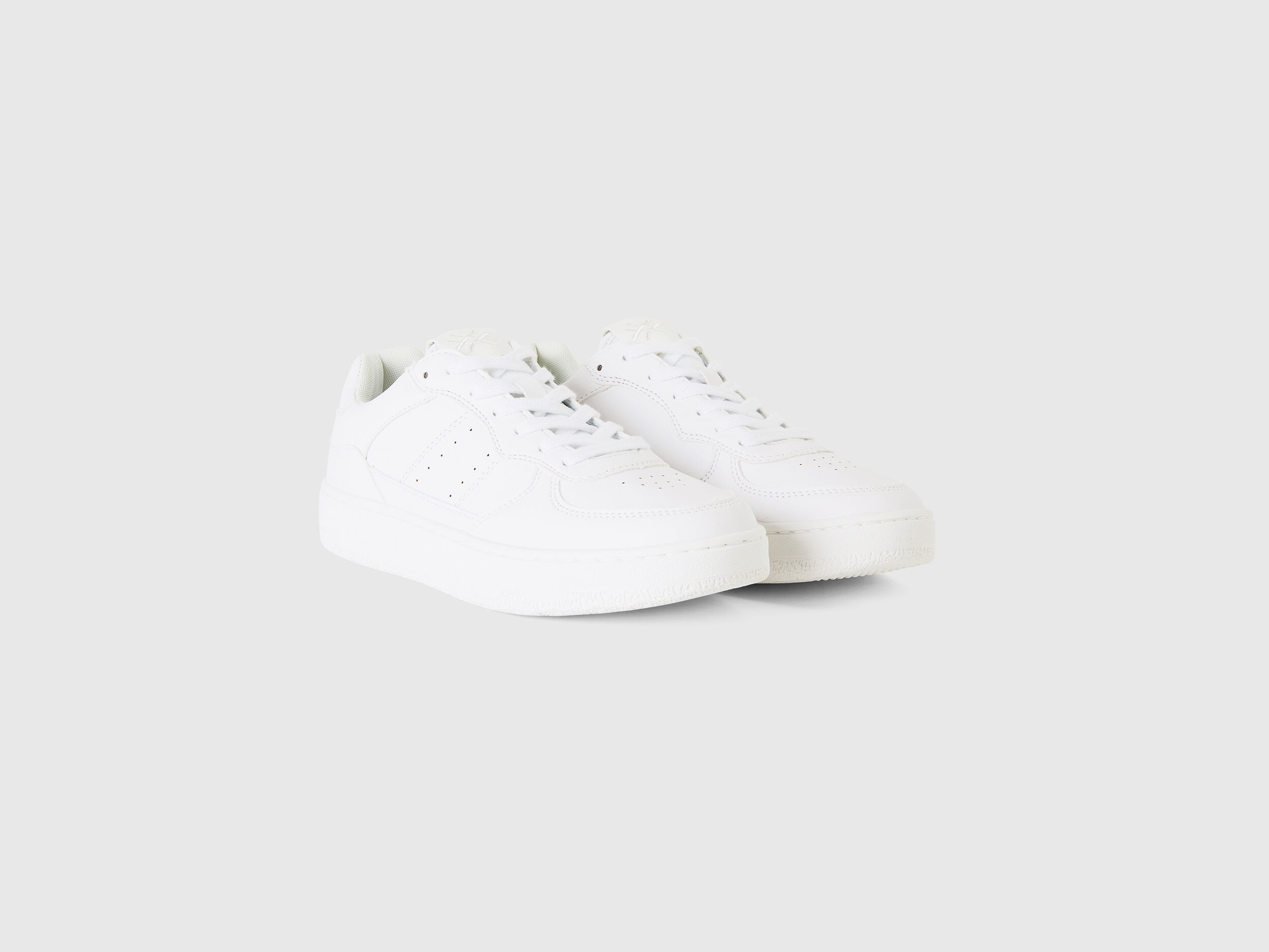 Ucb black top and white sneakers