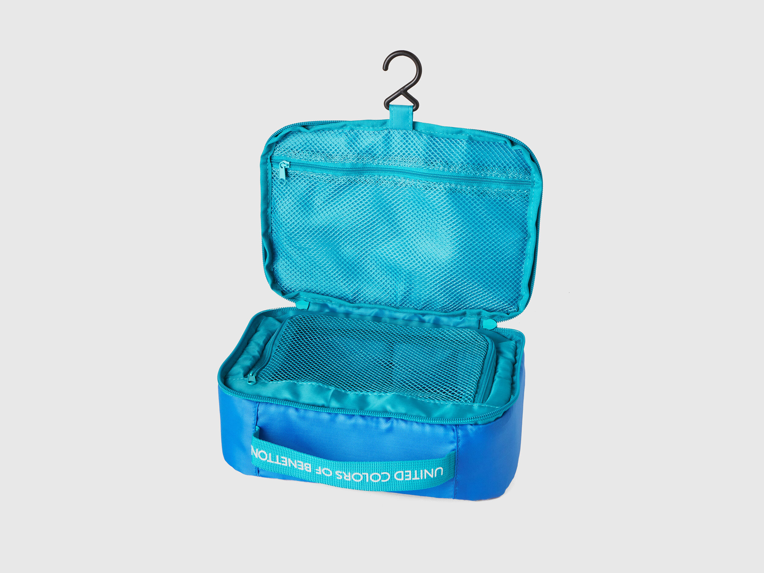 Blue travel toiletry bag with hook - Blue | Benetton Blue travel toiletry bag with hook - Blue | Benetton