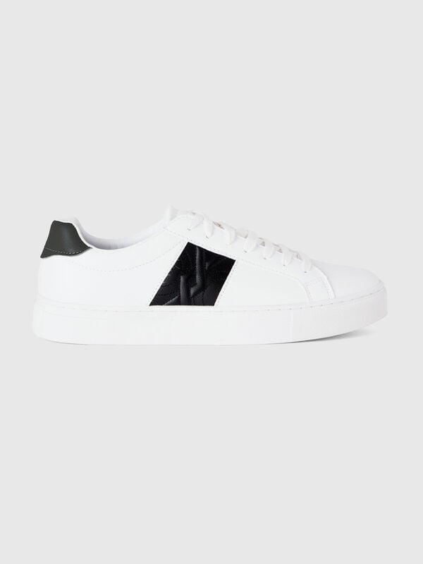 Low-top sneakers with black logo
