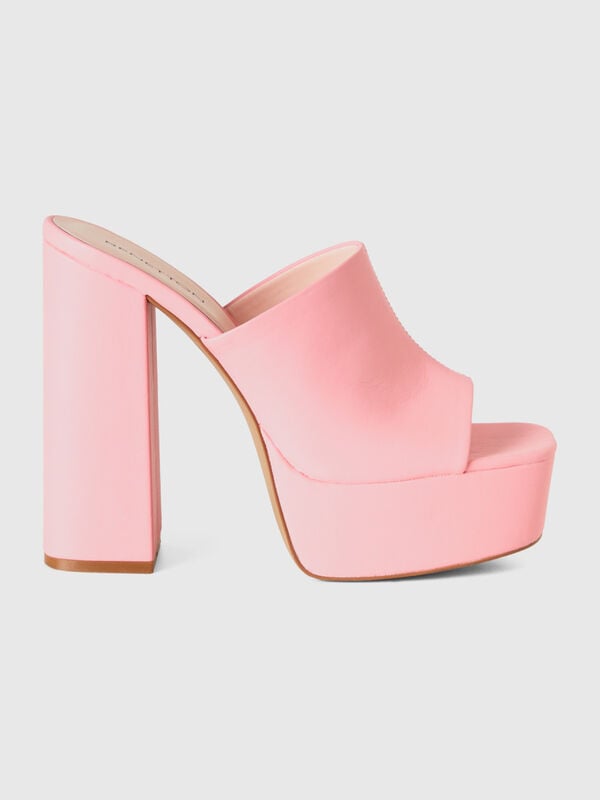 Pink mules with heel and platform