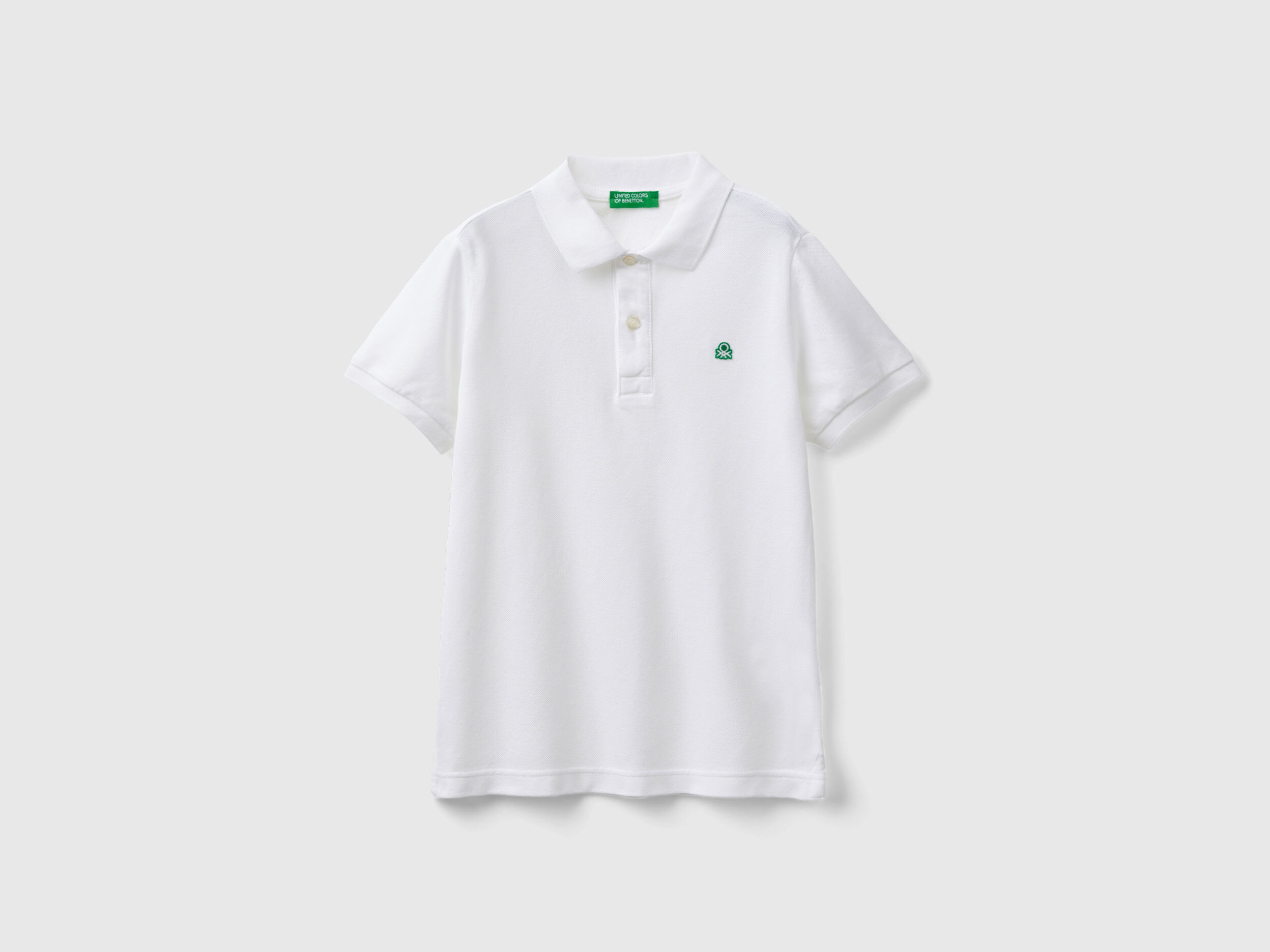 Slim fit polo in 100 organic cotton White Benetton