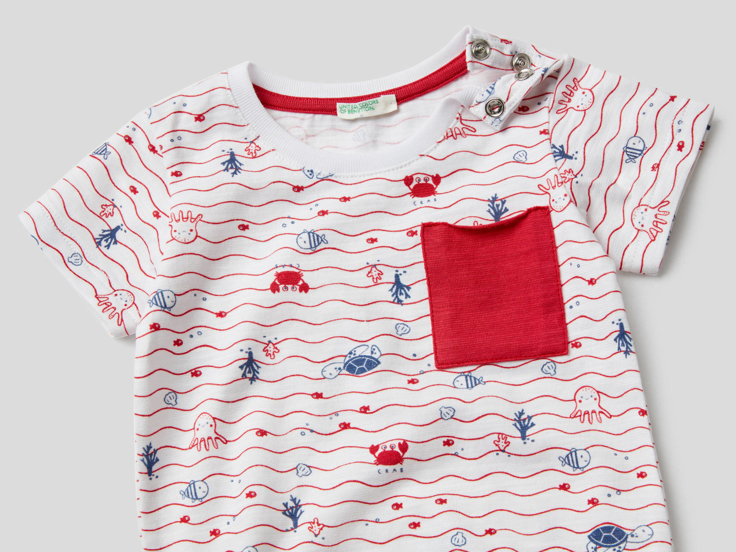 100% organic cotton bodysuit with pocket image number null