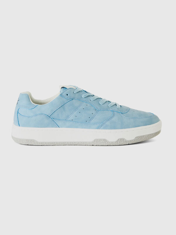 Light blue low-top canvas sneakers