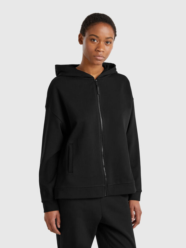 Sudadera 100% algodón con cremallera y capucha. Mujer