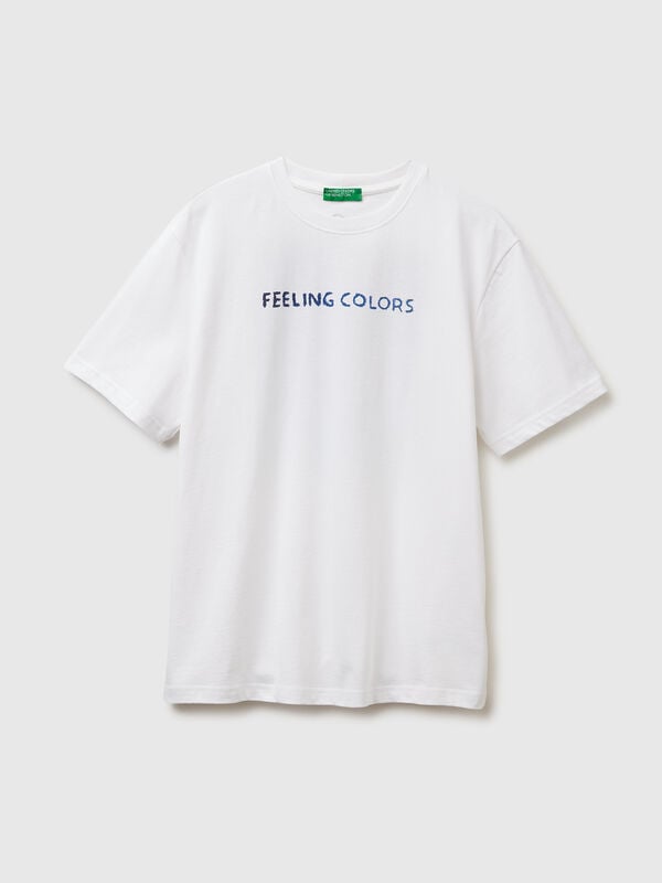 Camiseta de corte relajado con estampado delantero y trasero. Hombre