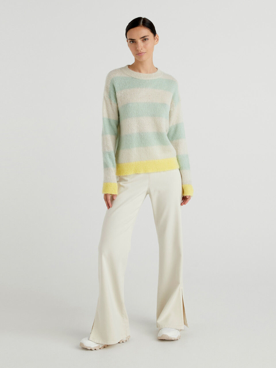 Flared trousers with slits