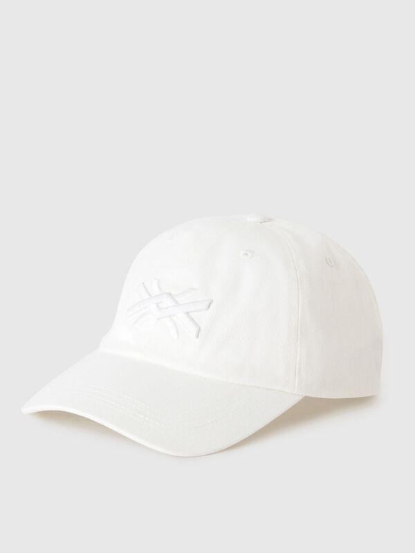 White cap with embroidered logo