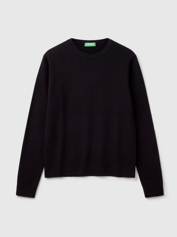 Suéter negro de cuello redondo en pura lana merino Suéter negro de cuello redondo en pura lana merino Mujer