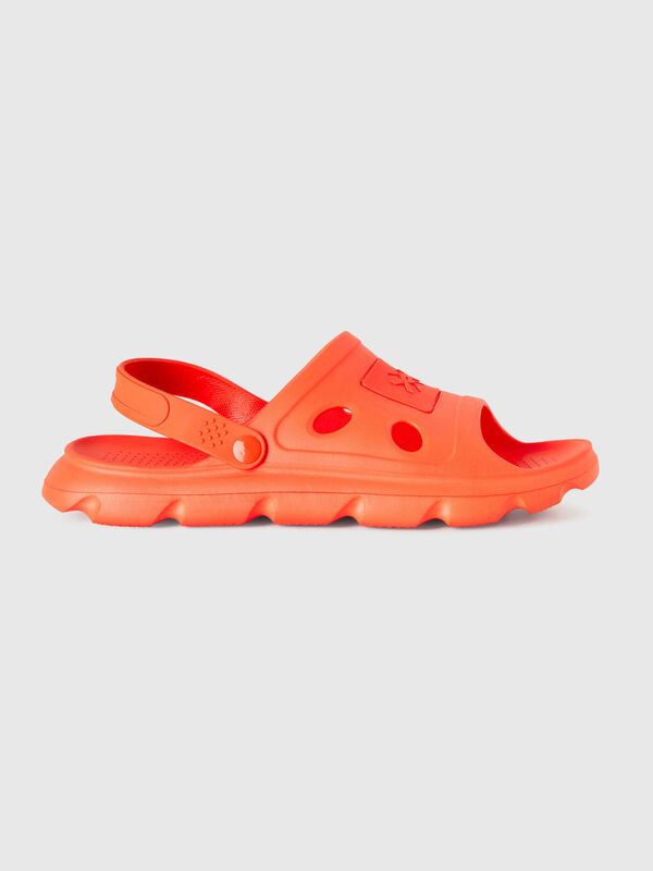 Orange sandals in lightweight rubber