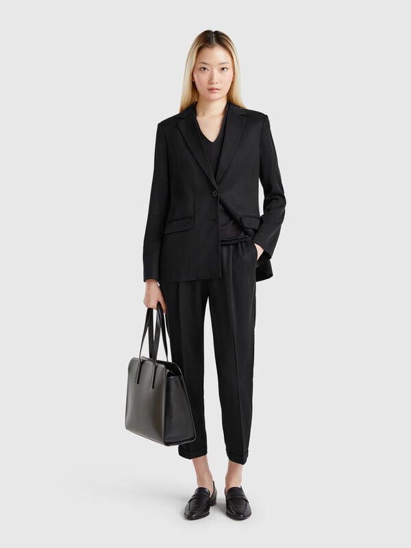Pantalón fluido con puños Mujer