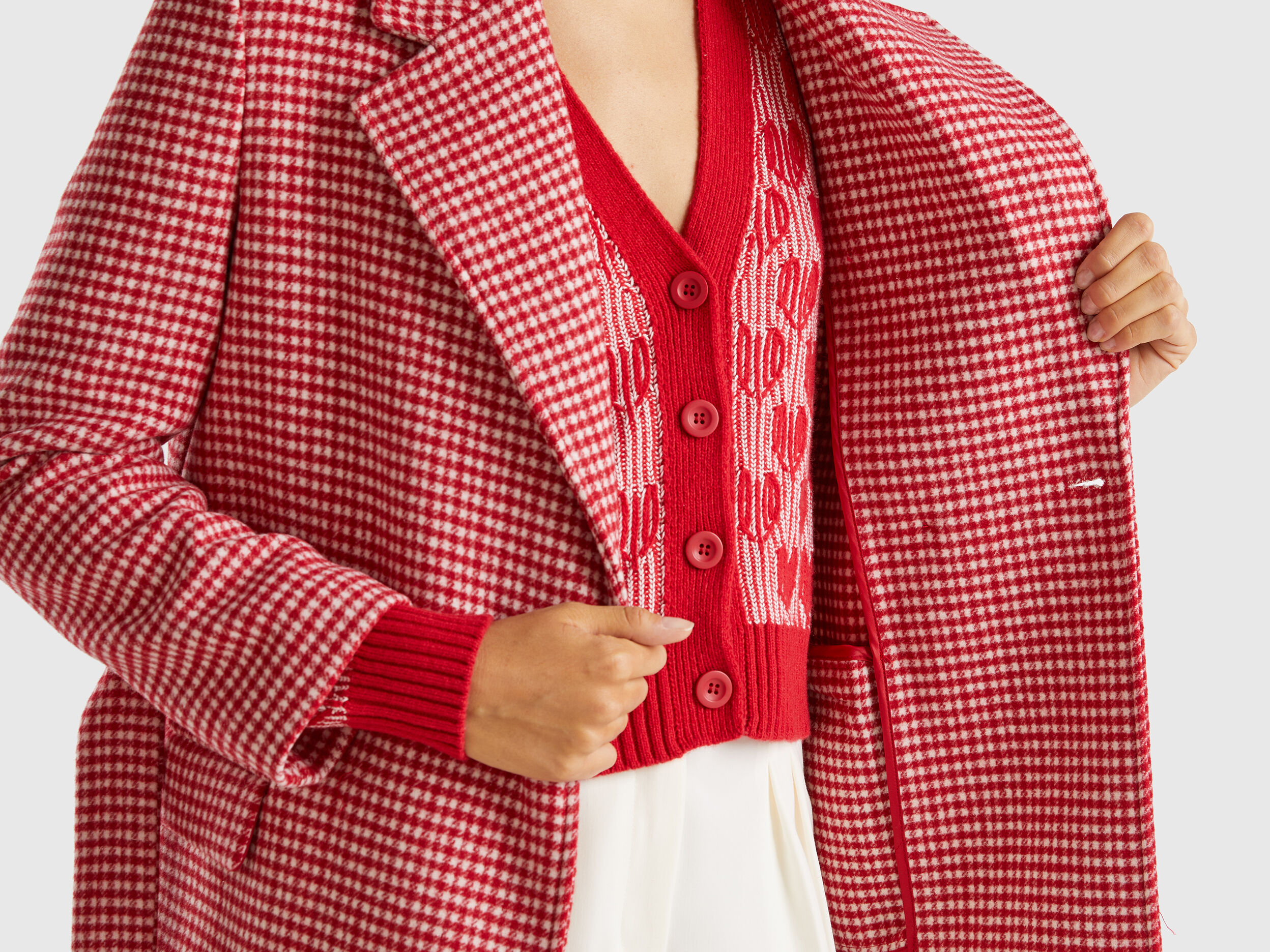 Red and white houndstooth coat store