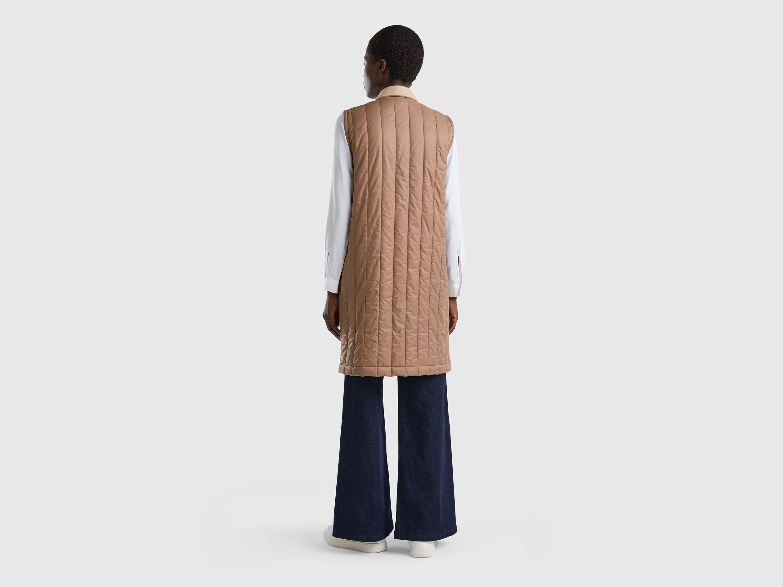 Sleeveless coat - Beige | Benetton