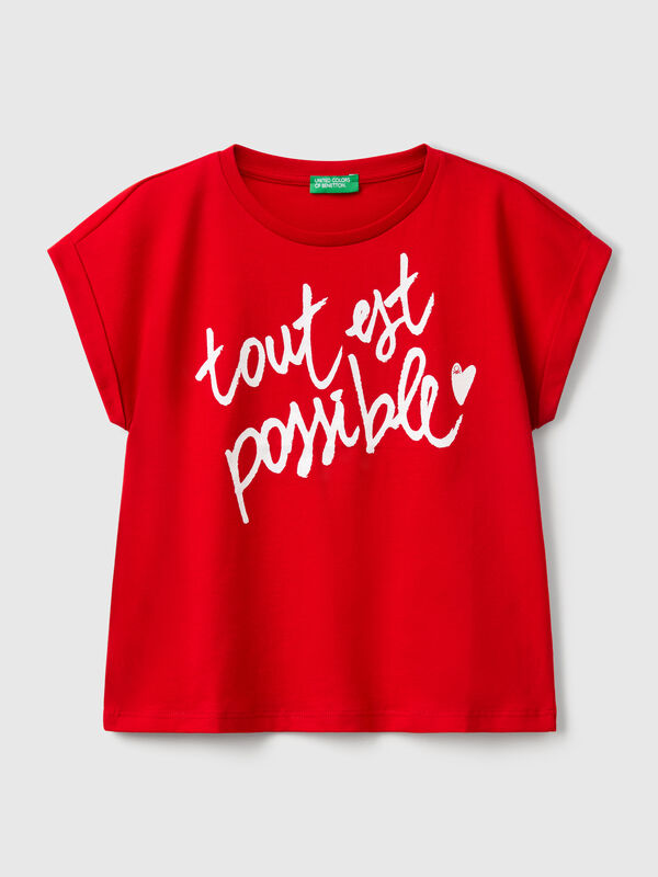 Camiseta boxy fit con estampado y purpurina Niña