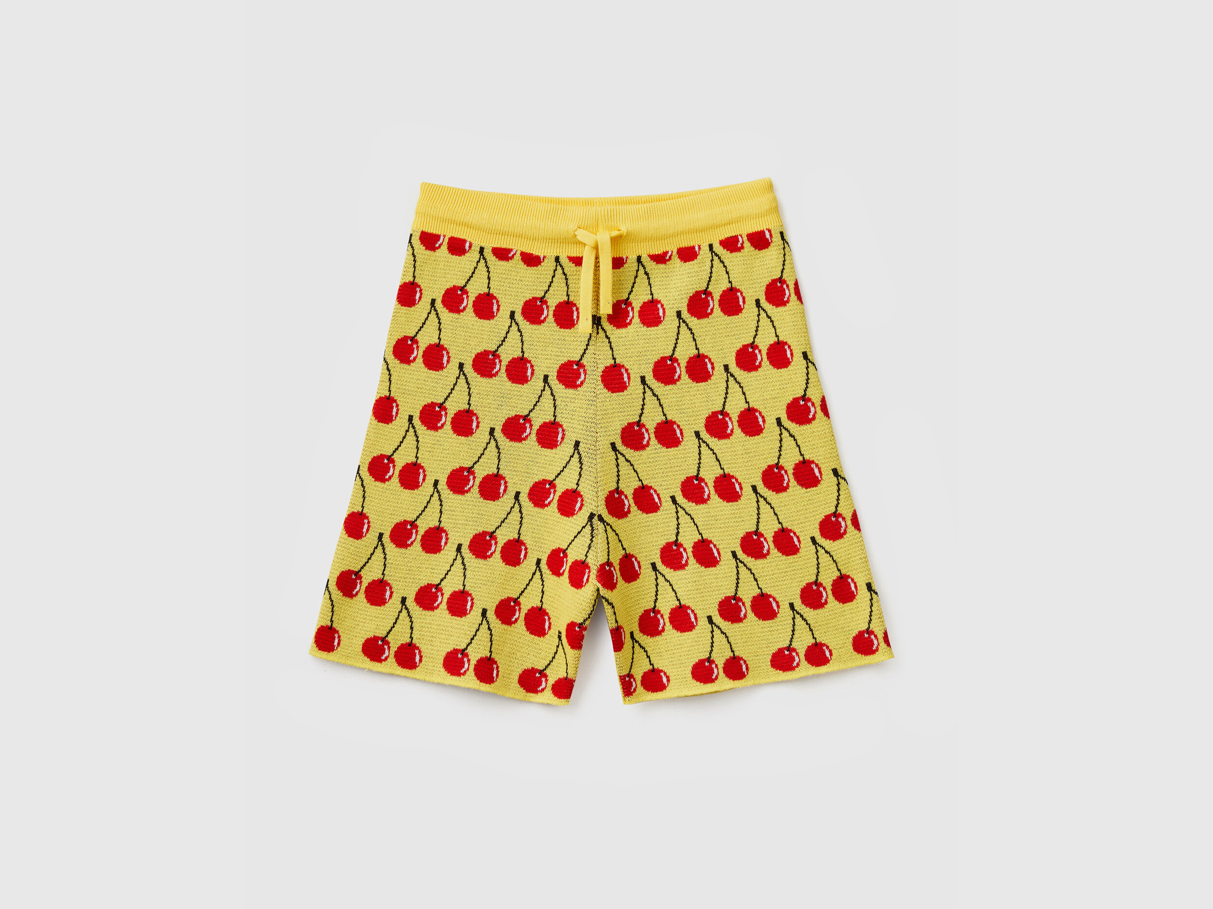 Bermudas amarillas con estampado de cerezas Amarillo Benetton
