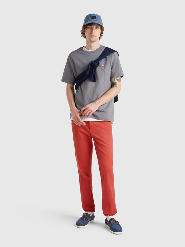 Brick red slim fit chinos Men