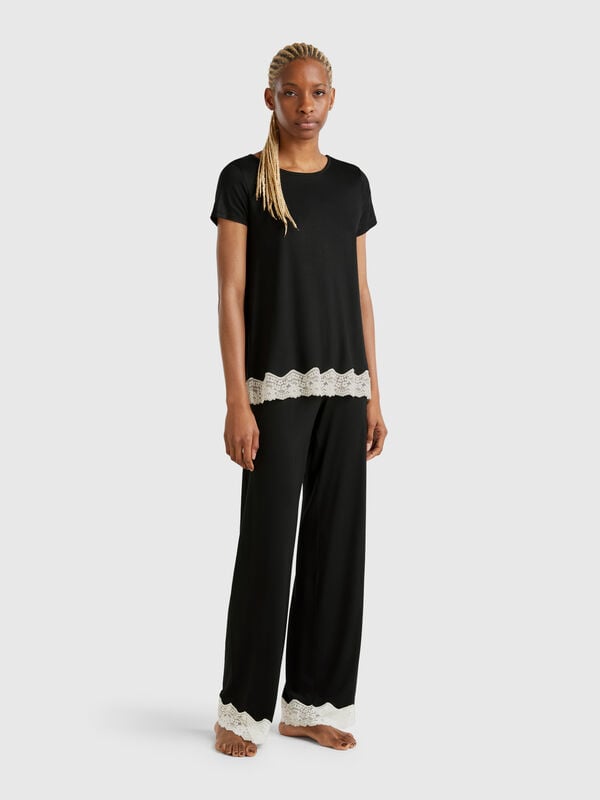 Flowy trousers with lace details Women