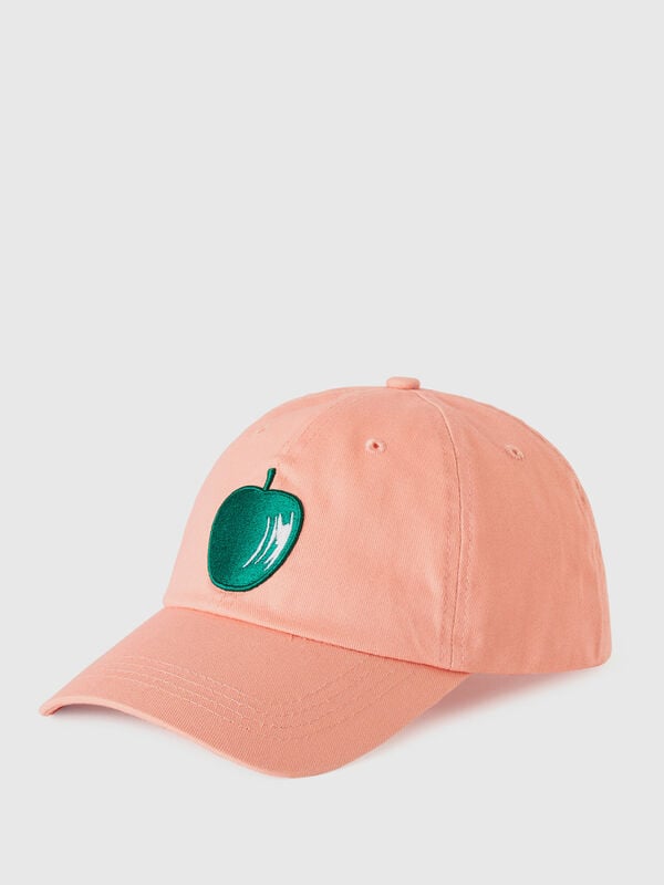 Pink hat with embroidered apple