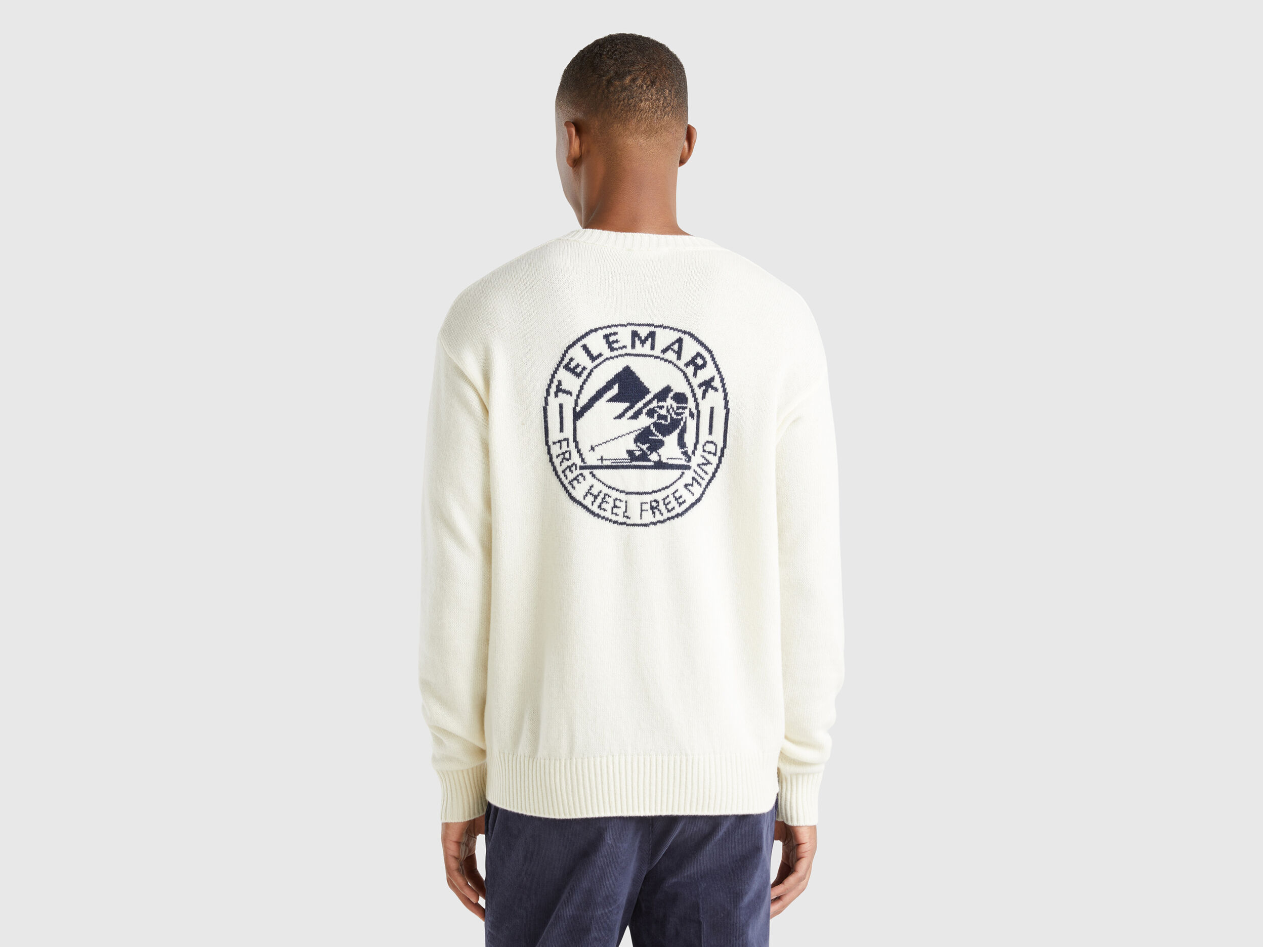 Wool blend sweater with ski graphic - Creamy White | Benetton Wool blend sweater with ski graphic - Creamy White | Benetton
