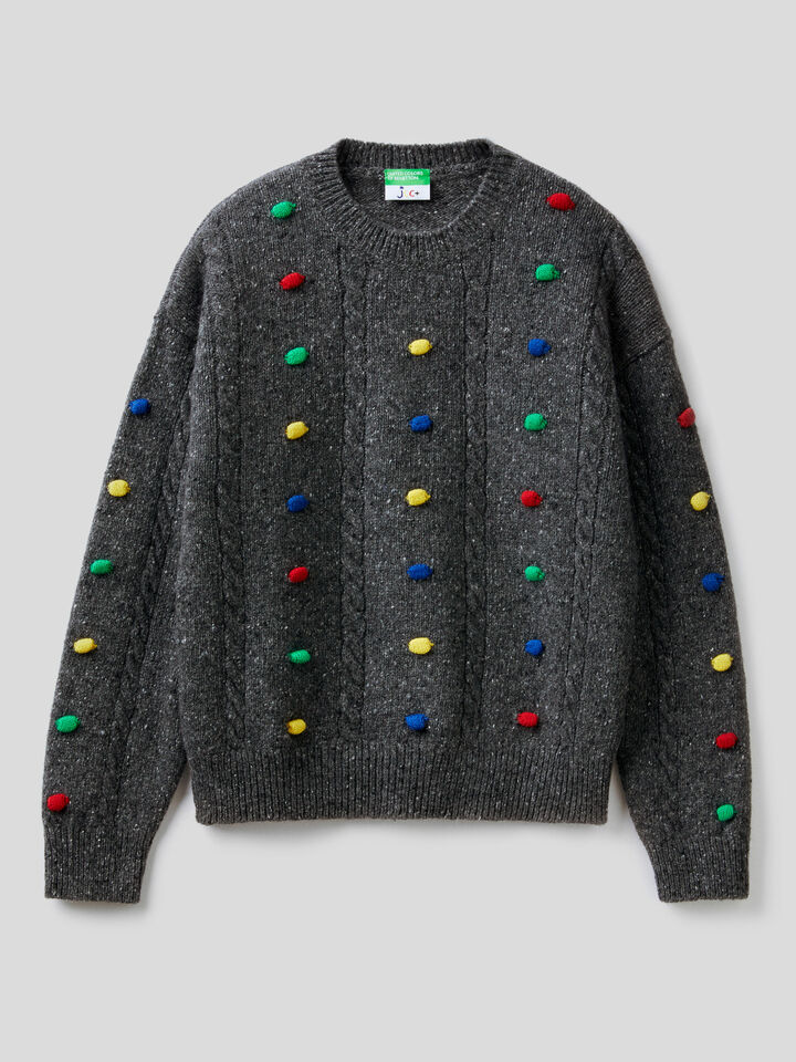 JCCxUCB sweater with pom pom image number 1