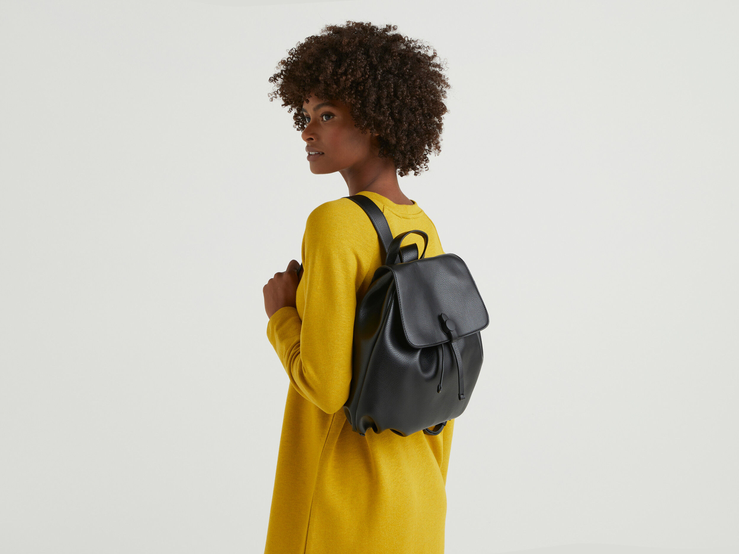 Drawstring backpack hot sale with flap