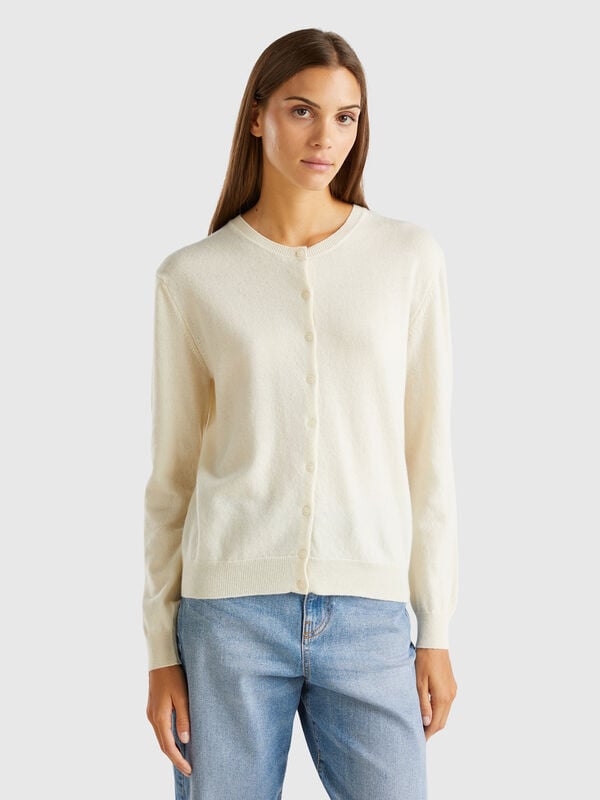 Cárdigan en color crema de cuello redondo de pura lana merina Mujer