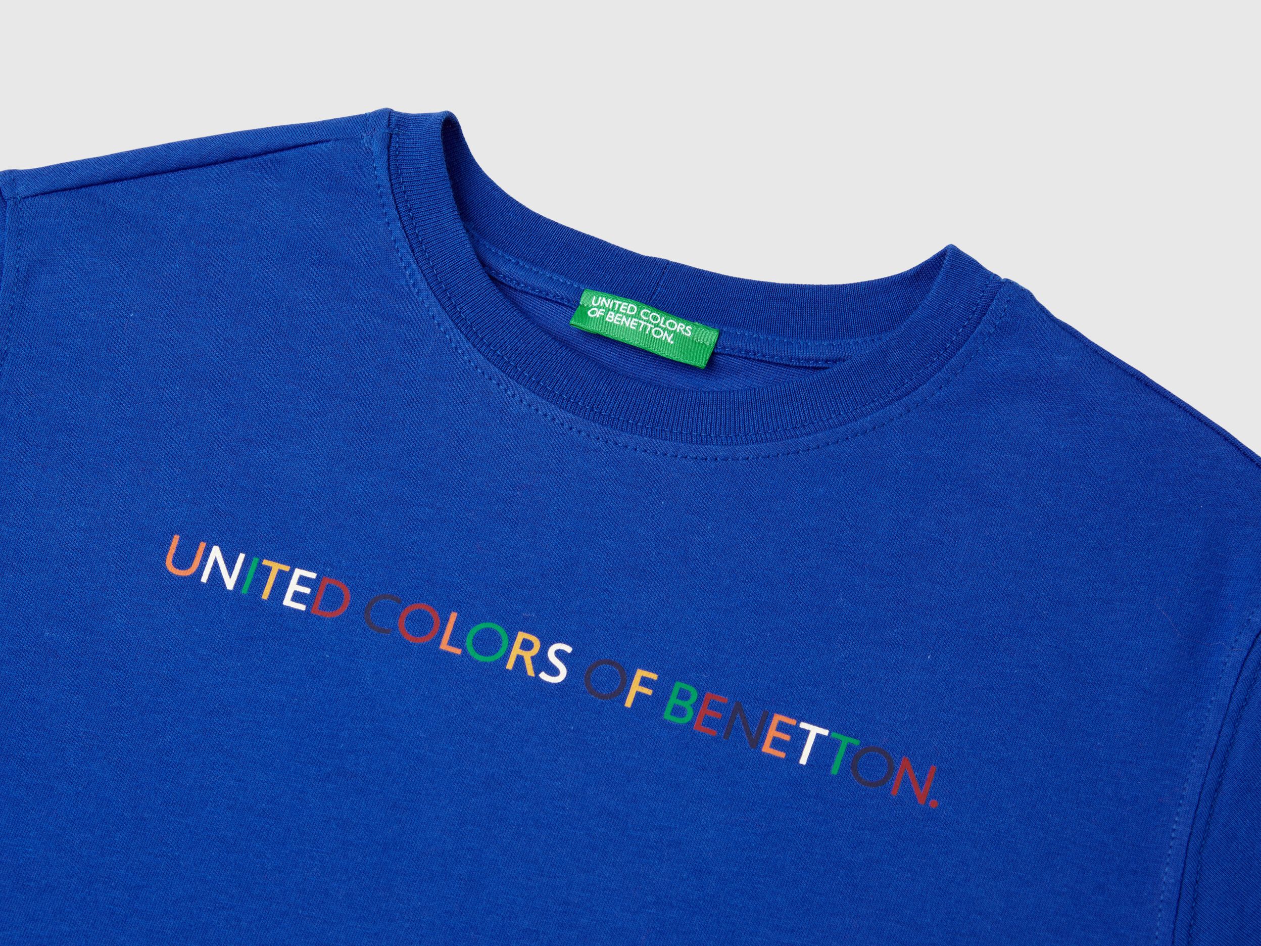 Vintage benetton t shirt on sale