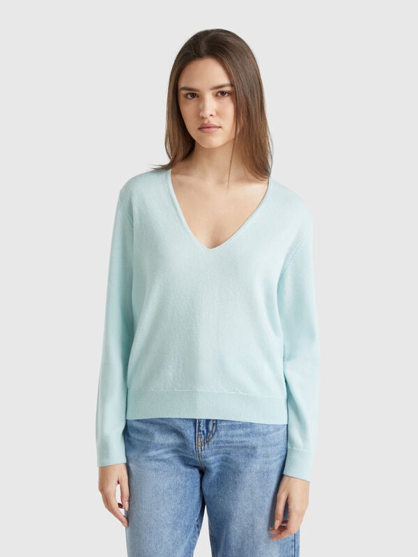 Jersey de pura lana merina con escote de pico Mujer
