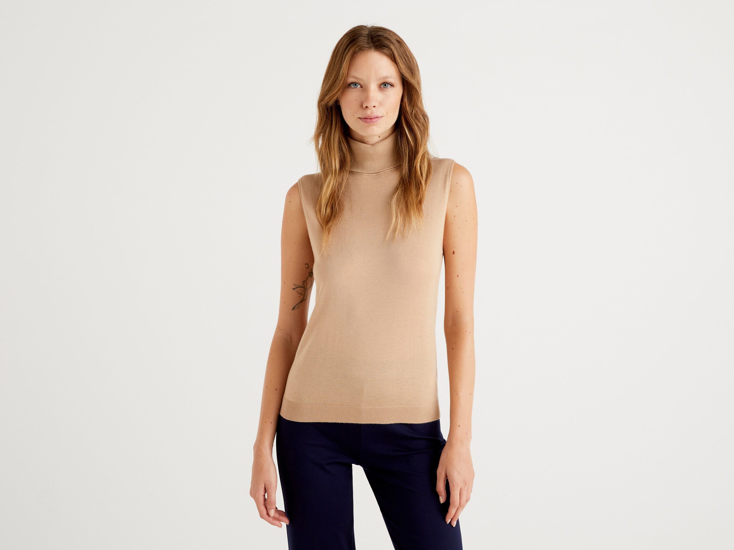 Beige online sleeveless turtleneck